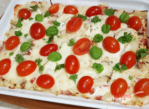 Przepis Zapiekany kalafior z serem i pomidorami